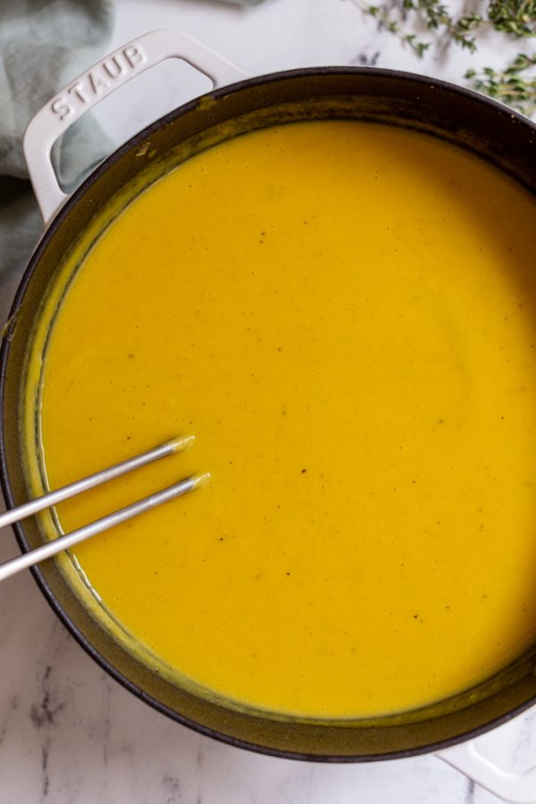 creamy butternut squash soup in a dutchoven 