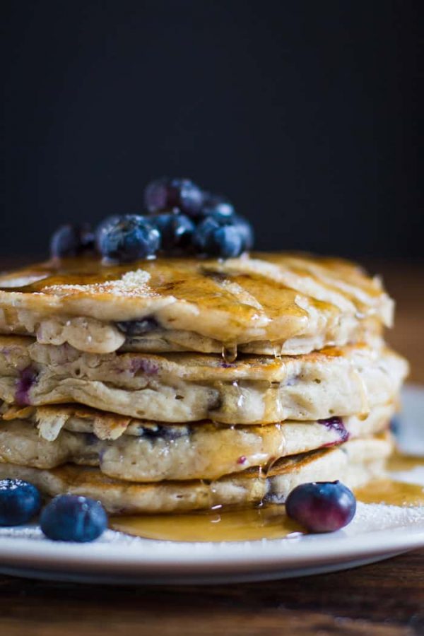 VEGAN Blueberry Pancakes- this pancake recipe is easy to throw together and results in the FLUFFIEST and yummiest breakfast!