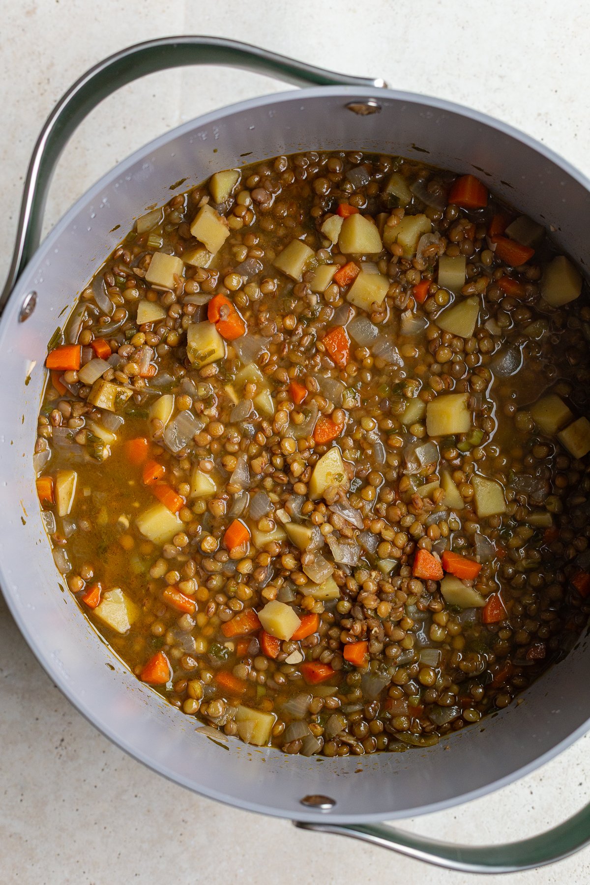 chunky lentil soup in a large pot