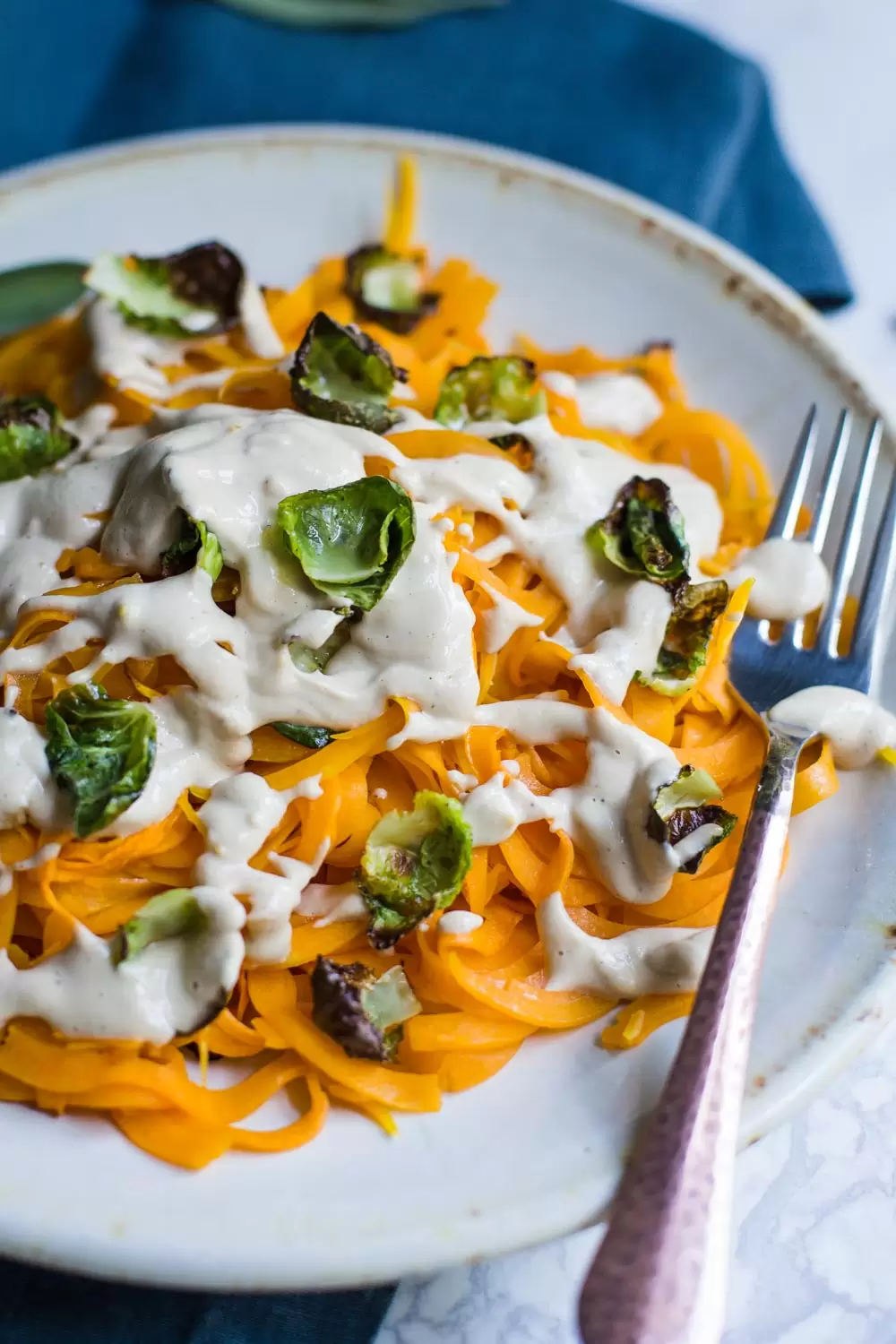 Creamy Butternut Squash Pasta with Crispy Brussels Sprouts- this recipe is vegan, healthy, and SO very satisfying as a good fall dinner!
