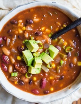 Loaded Vegan Chili- this vegetable chili has 3 different kinds of beans in it making it a very satisfying and filling chili that even meat eaters will love!