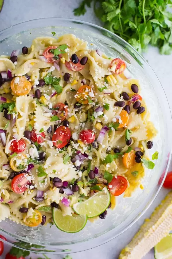 Mexican Inspired Pasta Salad- this quick and easy vegetarian pasta salad is the perfect party dish or weeknight meal with delicious leftovers!