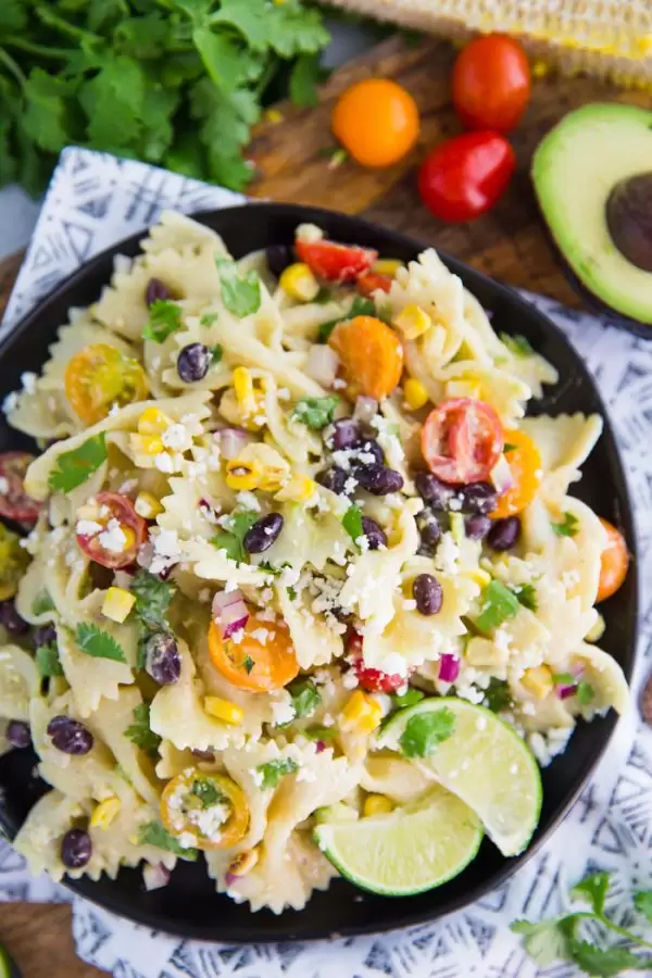Mexican Inspired Pasta Salad- this quick and easy vegetarian pasta salad is the perfect party dish or weeknight meal with delicious leftovers!