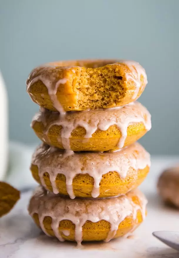pumpkin donuts stacked up