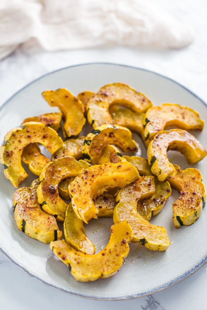 roasted delicata squash on a plate