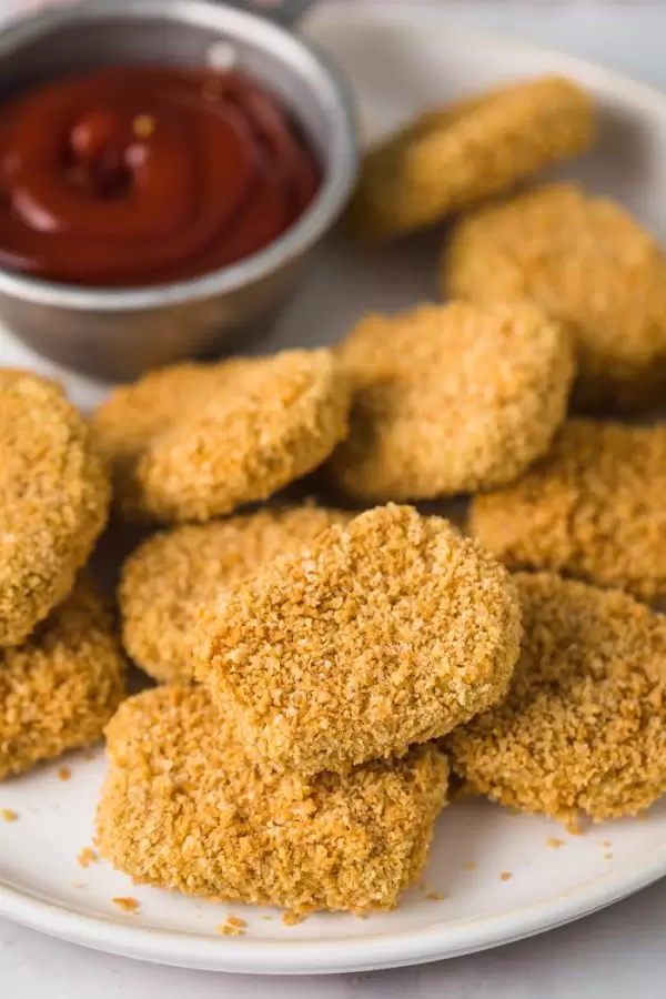 EASY Chickpea Nuggets- Vegan AND Gluten Free, these nuggets are the perfect meat-free alternative to your kids favorite meal! Easy to make and so delicious!
