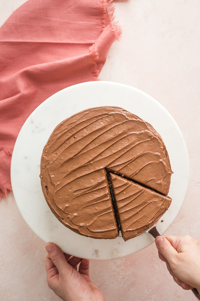 chocolate cake on a marble cake stand