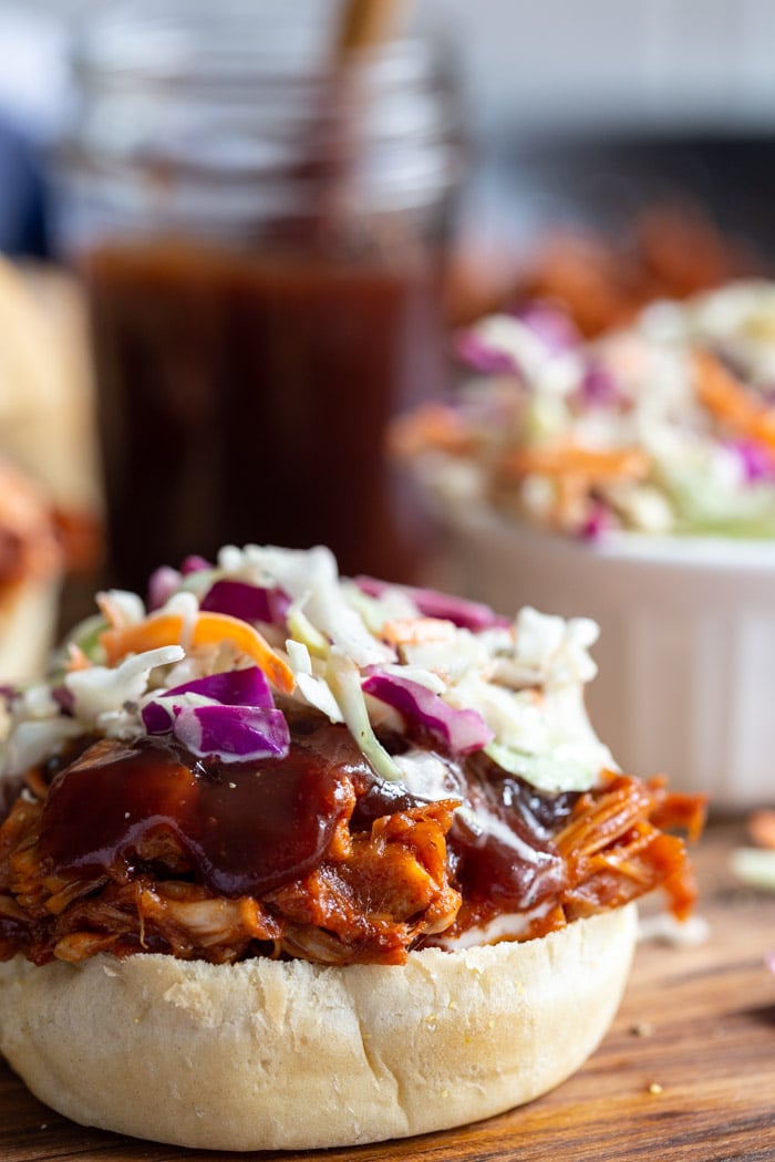 jackfruit pulled pork on a bun and topped with bbq sauce and coleslaw