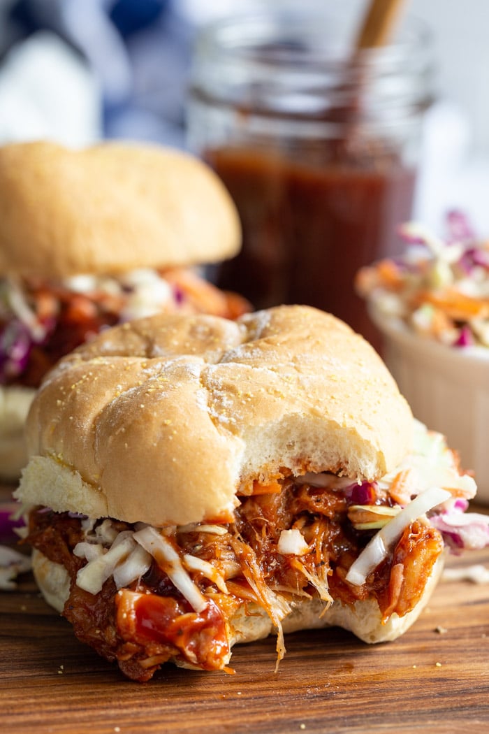 jackfruit pulled pork on a bun and topped with bbq sauce and coleslaw