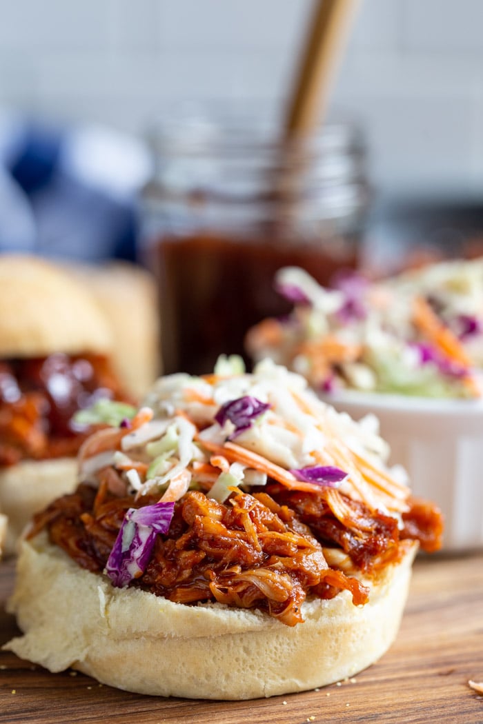 jackfruit pulled pork on a bun and topped with bbq sauce and coleslaw