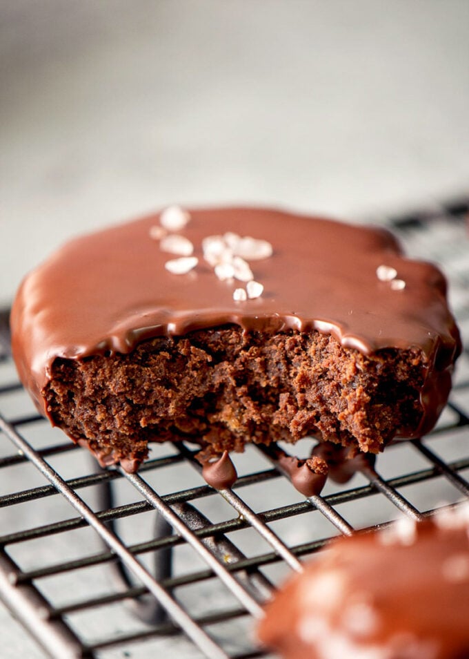 vegan dessert brownie covered in melted chocolate and a sprinkle of sea salt