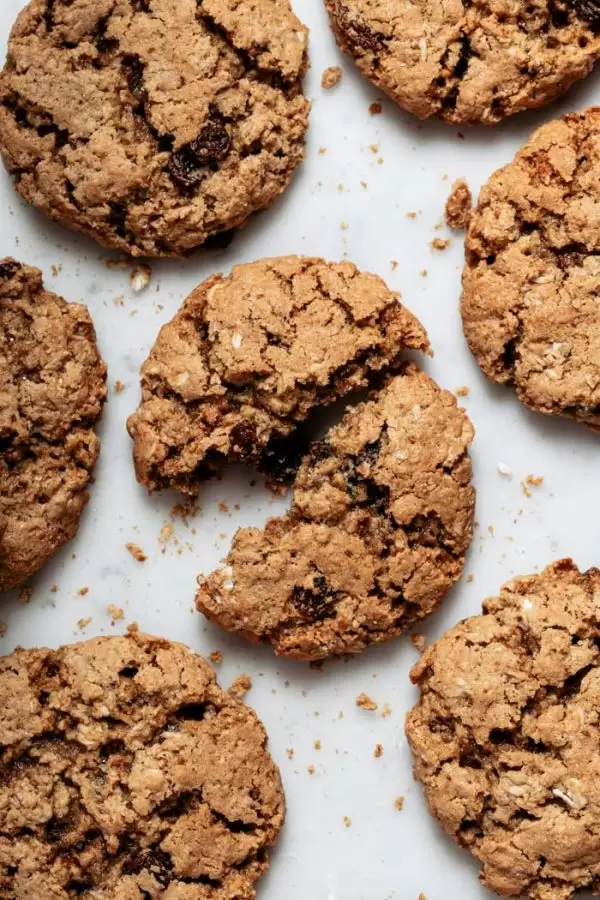 vegan oatmeal cookies with raisin on a white background