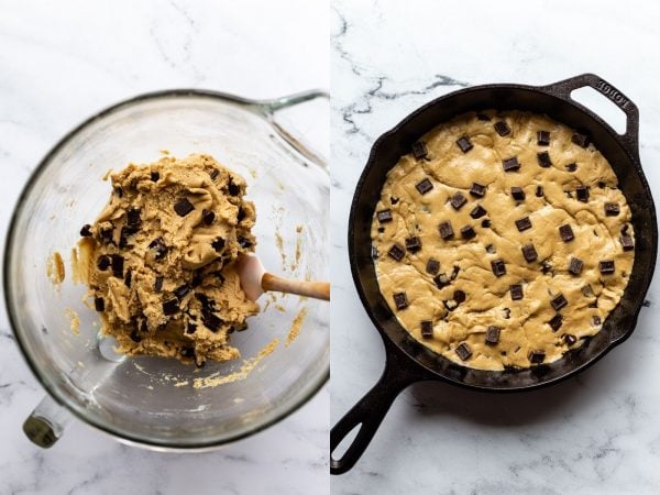 side by side shot: (left) top down shot on a marble board of a stand mixer glass bowl with chocolate chip cookie dough in it and a spatula out the side. (right) top down shot on a marble board of a black cast iron skillet filled with raw chocolate chunk cookie dough