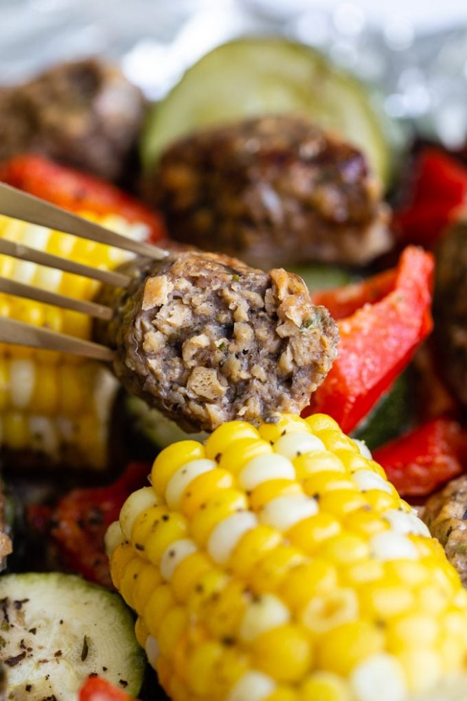 up close of vegan sausage nestled in veggies