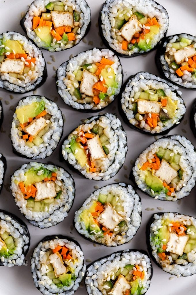 Big sushi set made of fresh vegetables and seafood Stock Photo by