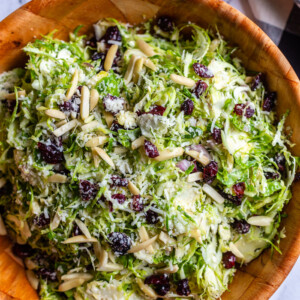 Brussel Sprout Salad topped with cranberries and almonds