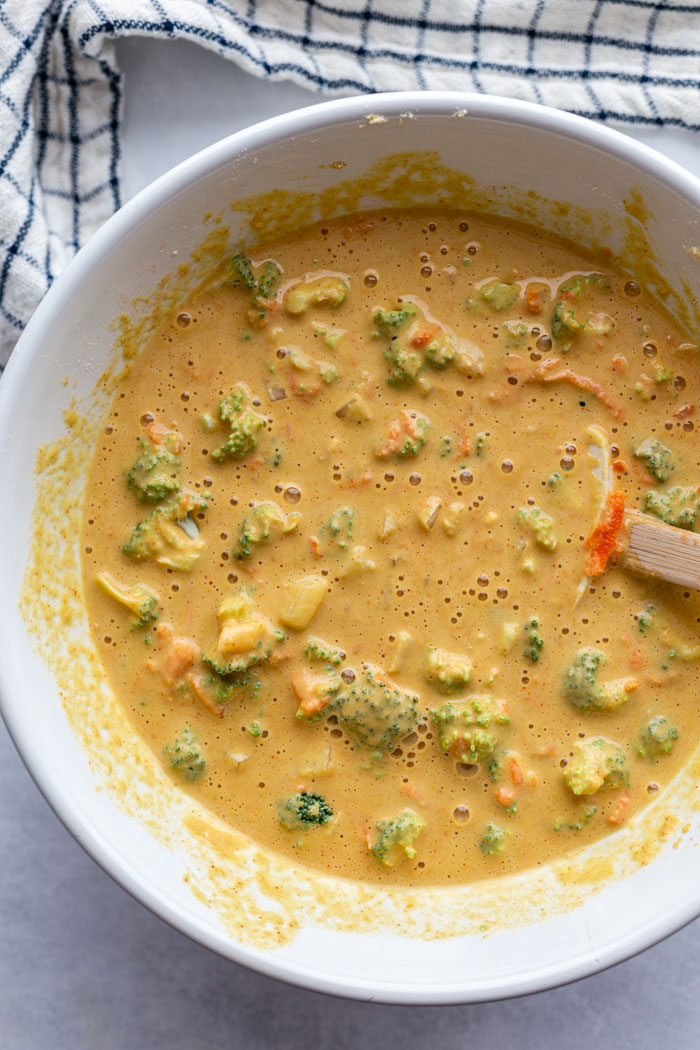 large white bowl filled with chickpea flour mixture for vegan "egg" cups