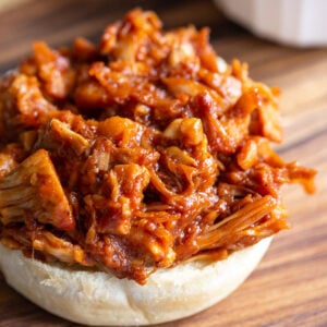 bbq jackfruit on the bottom half of a bun