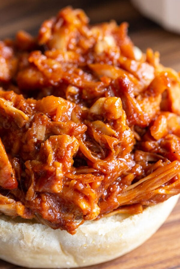 bbq jackfruit on the bottom half of a bun