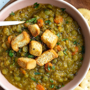 vegan split pea soup topped with croutons