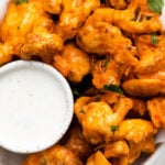 Air Fryer Buffalo Cauliflower served with blue cheese dressing