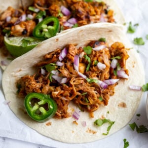 jackfruit carnitas tacos sprinkled with cilantro