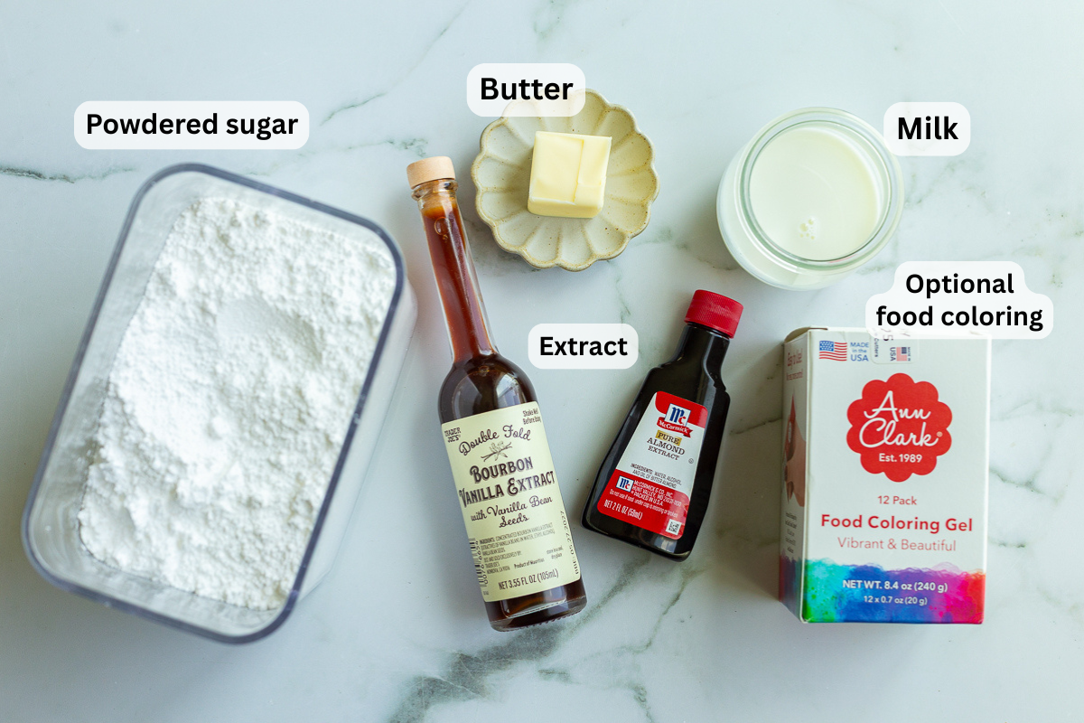 ingredients needed to make sugar cookie frosting including powdered sugar, vanilla, milk, and butter