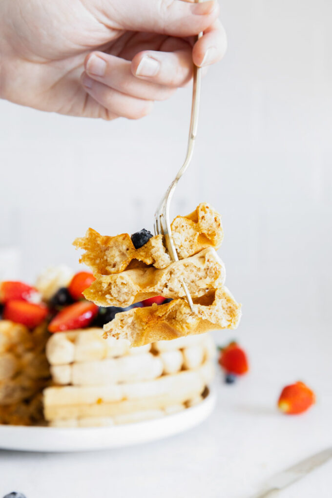 a bite of waffles on a fork
