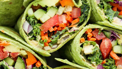 veggie wraps filled with hummus and rainbow veggies