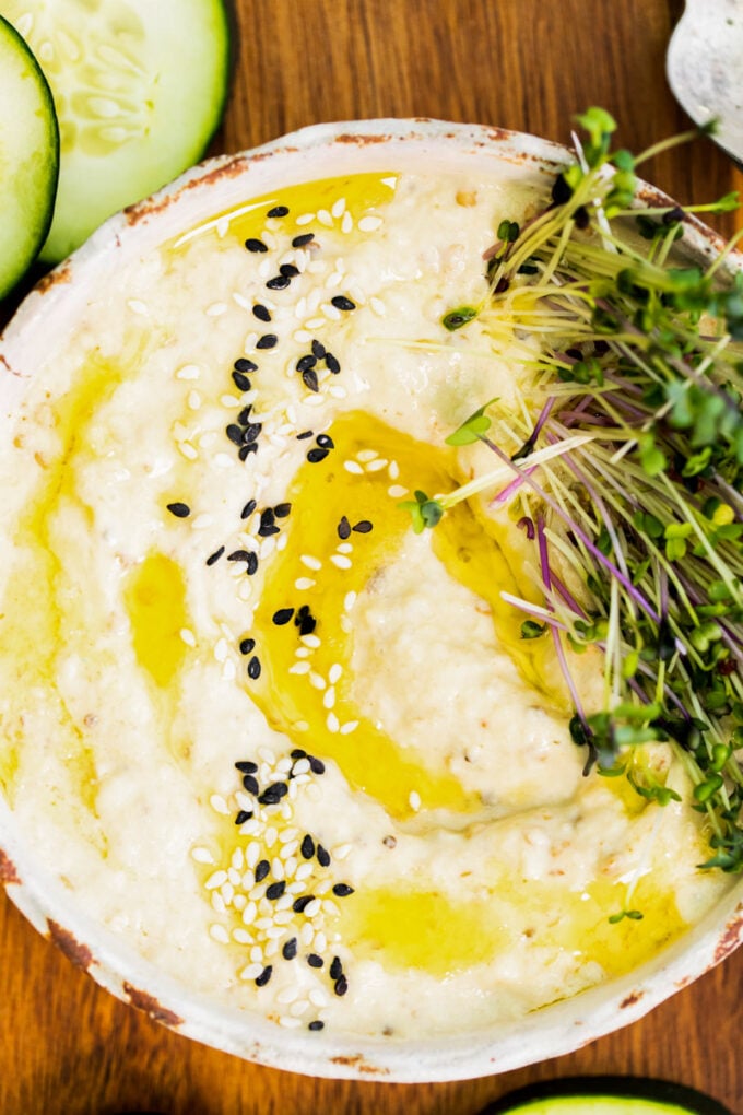 Baba Ganoush dip topped with a drizzle of olive oil and sesame seeds