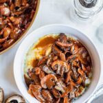 Mushrooms Bourguignon served in a white bowl