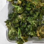 air fryer kale chips in a large serving tray
