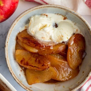 Baked Cinnamon Apples topped with vanilla ice cream