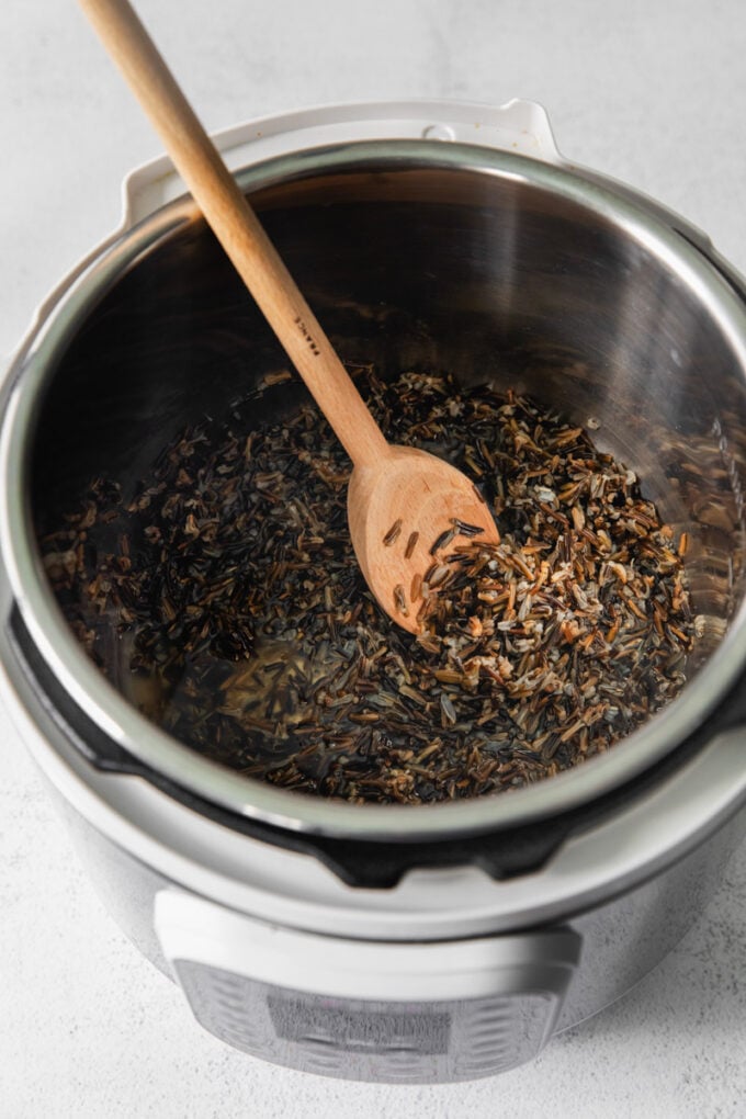 stirring rice in an Instant Pot