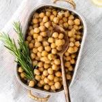 instant pot chickpeas served in a dish with fresh rosemary