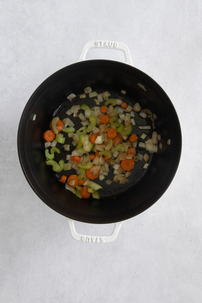 sautéing onion, carrot and celery in a large pot