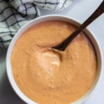 chipotle mayo in a large white bowl with a spoon