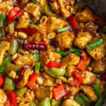 Kung Pao Tofu cooked in a large skillet