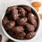 Chocolate Covered Almonds in a small white bowl