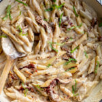 Chickpea Pasta cooked in a creamy sauce in a skillet.