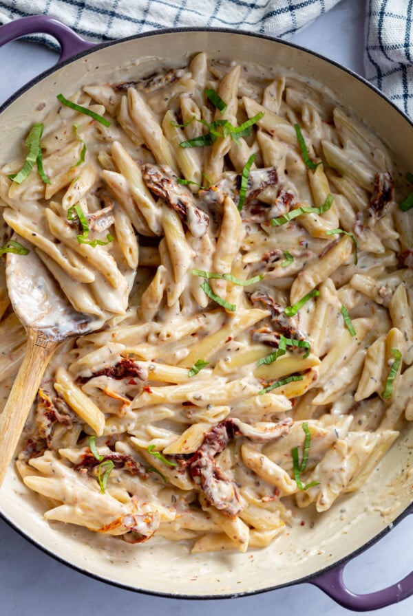 Chickpea Pasta cooked in a creamy sauce in a skillet.