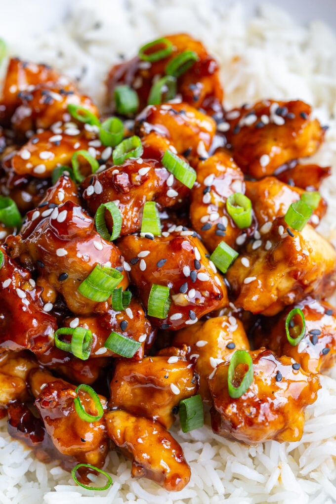sesame tofu on a bed of white rice
