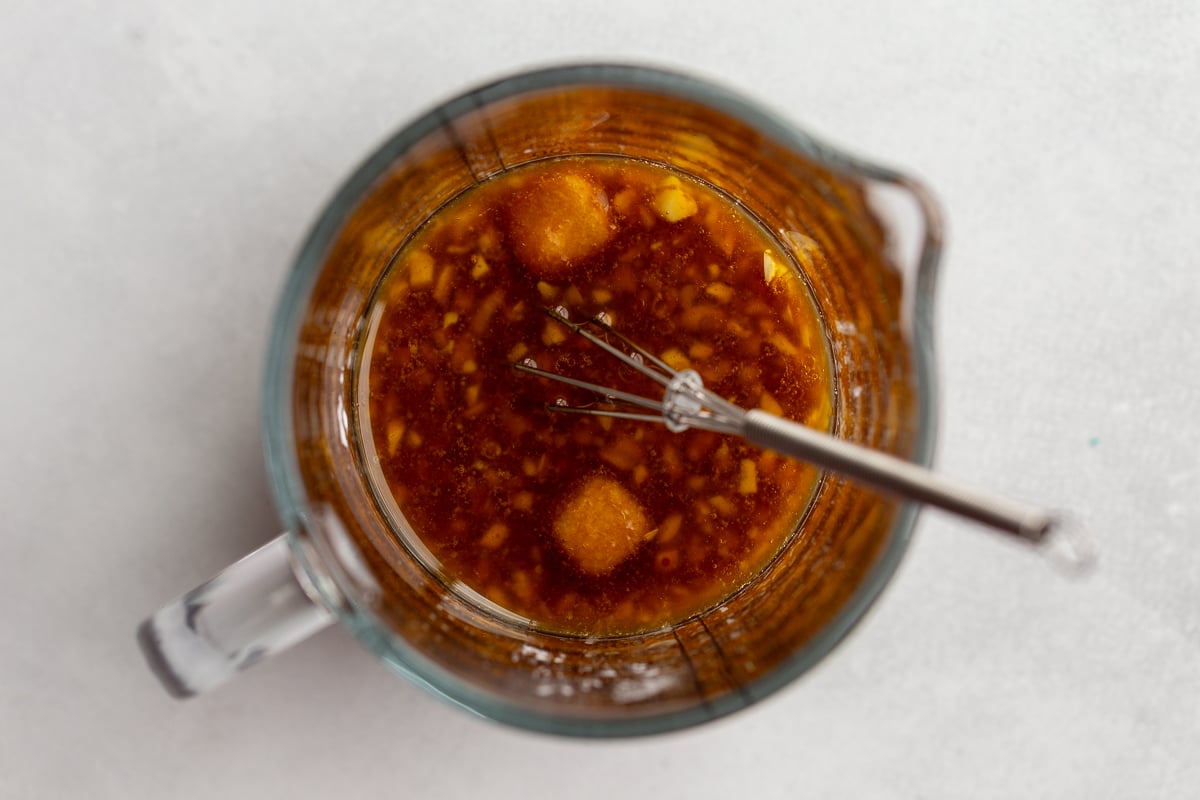sesame sauce whisked together in a measuring cup
