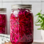 Pickled cabbage in a glass mason jar.