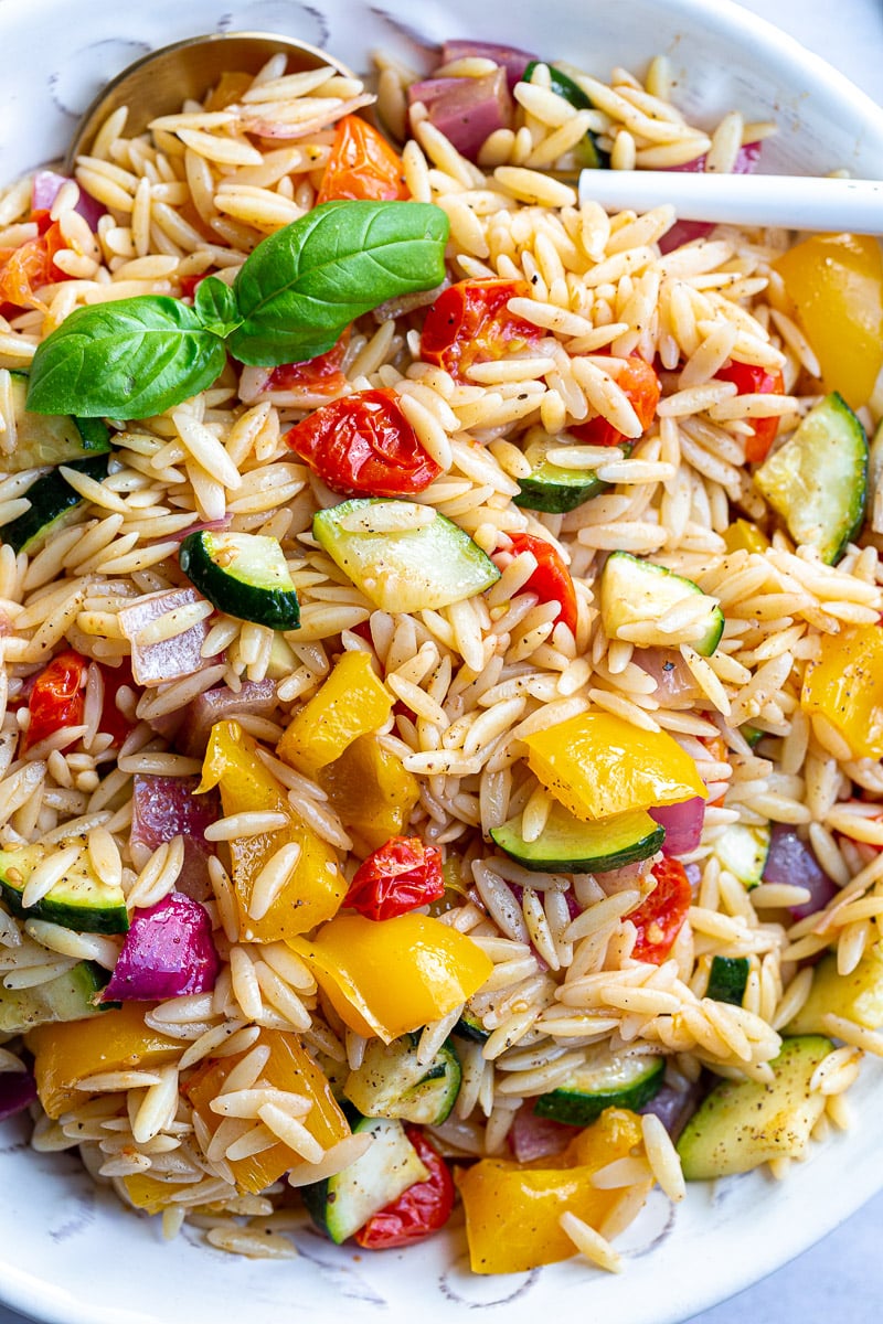 Zucchini, bell pepper, and red onion tossed with orzo pasta.