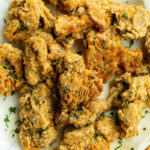 Fried oyster mushrooms on a plate.