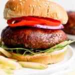 Portobello mushroom burger served with French fries.