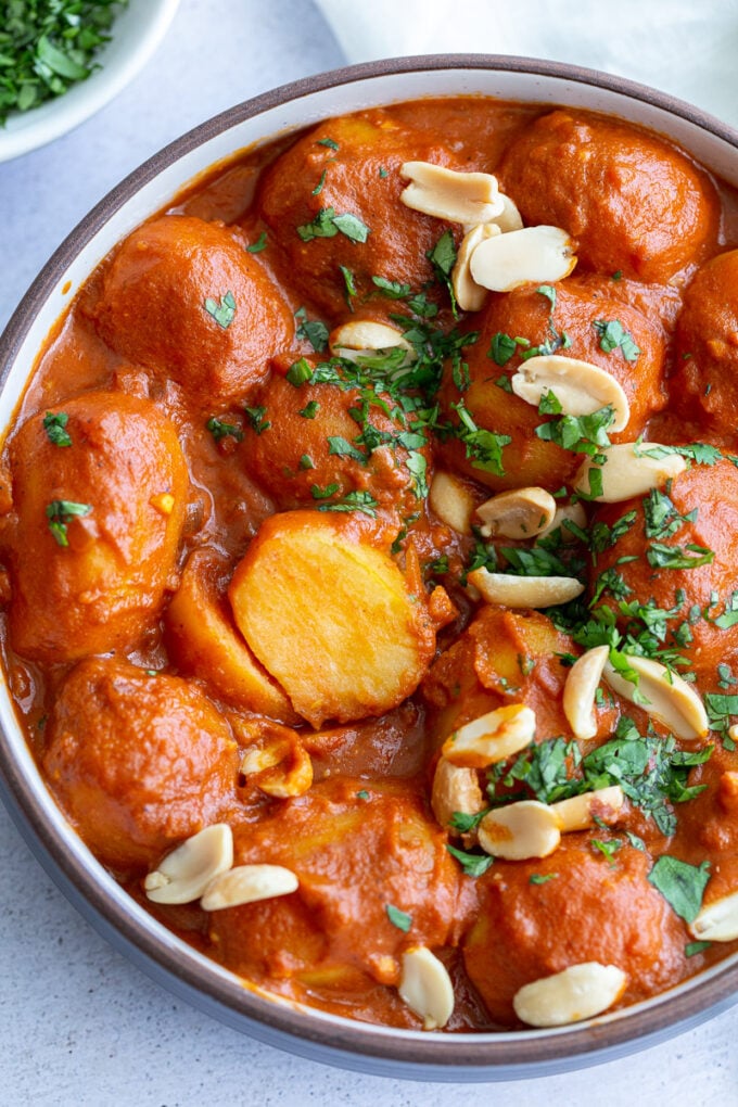 Potatoes served in a tomato based sauce.