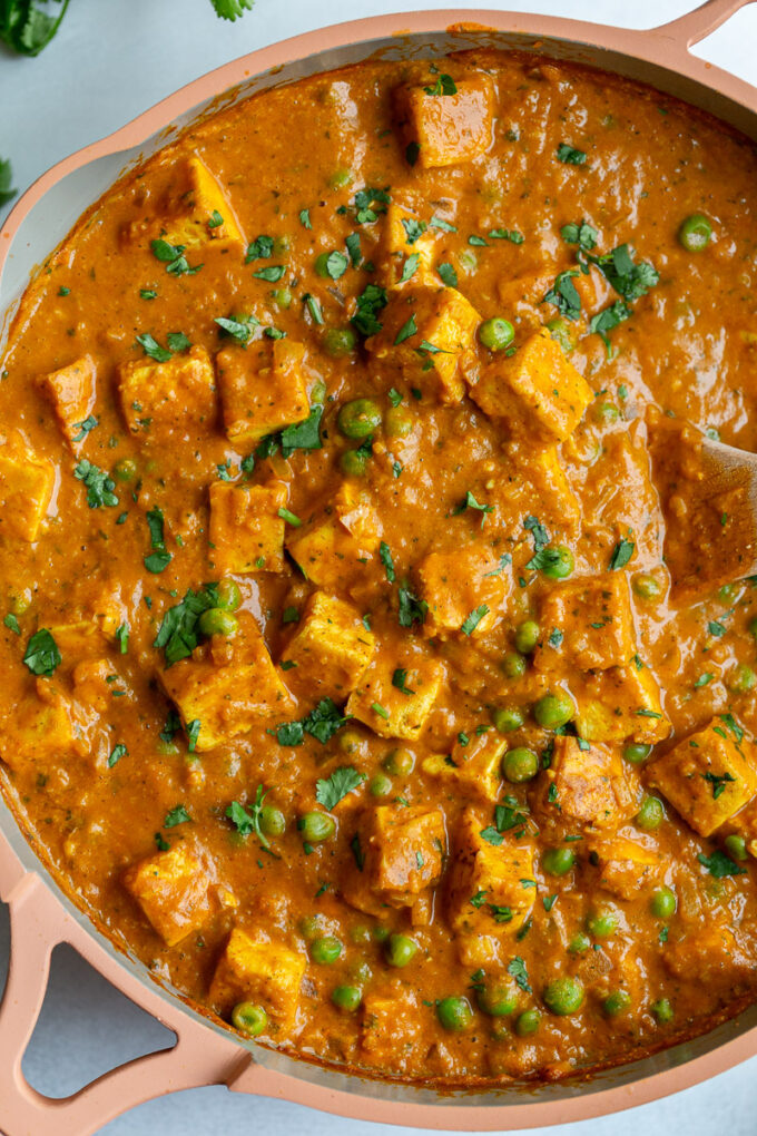 tofu tikka masala in a large pink skillet