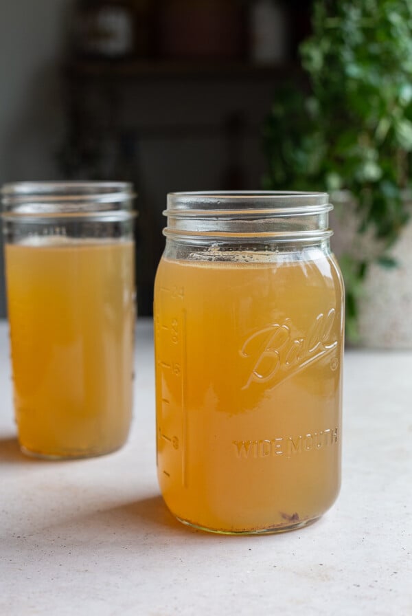 2 large mason jars of bone broth for dogs